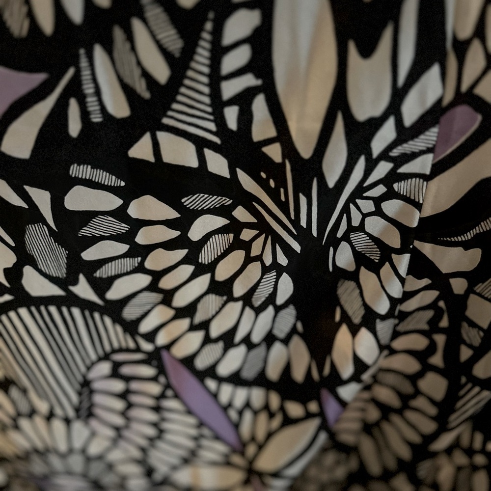 beautiful silk strapless dress. Butterfly accents in pattern. Size 8